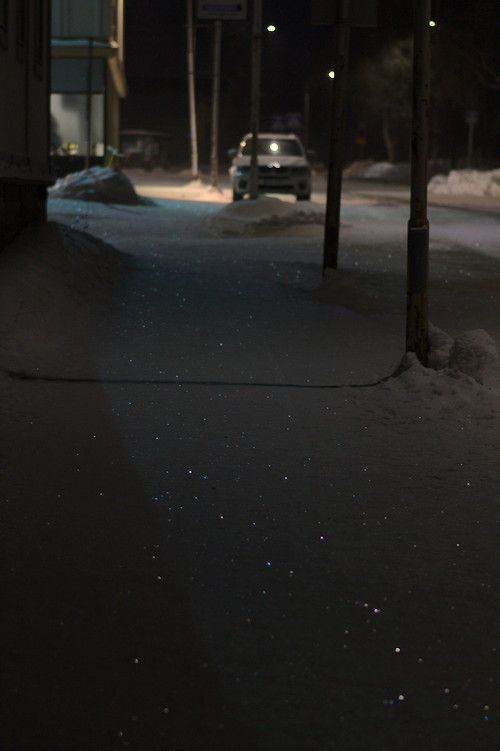 Town view with glittering snow